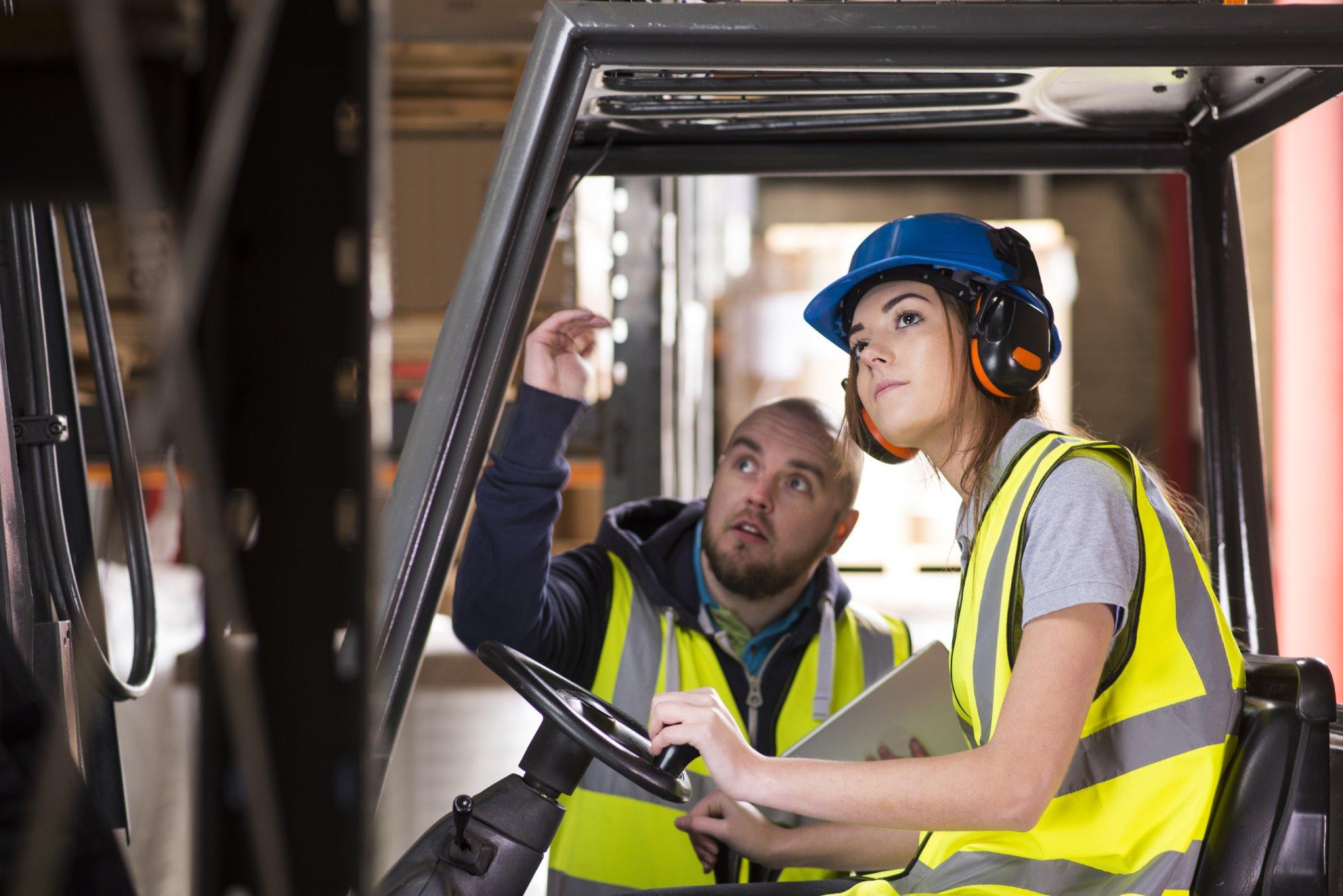 Female forklift driver training