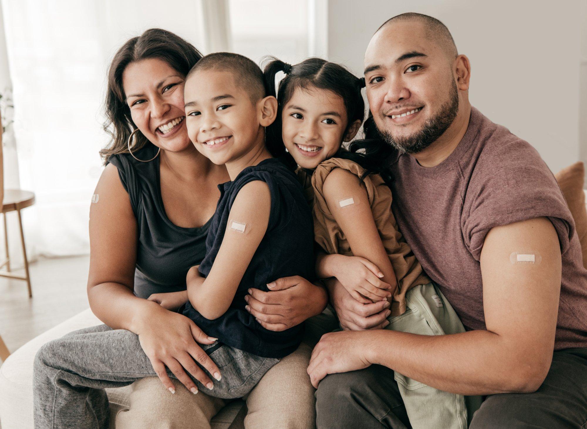 Vaccinated family portrait - four people with