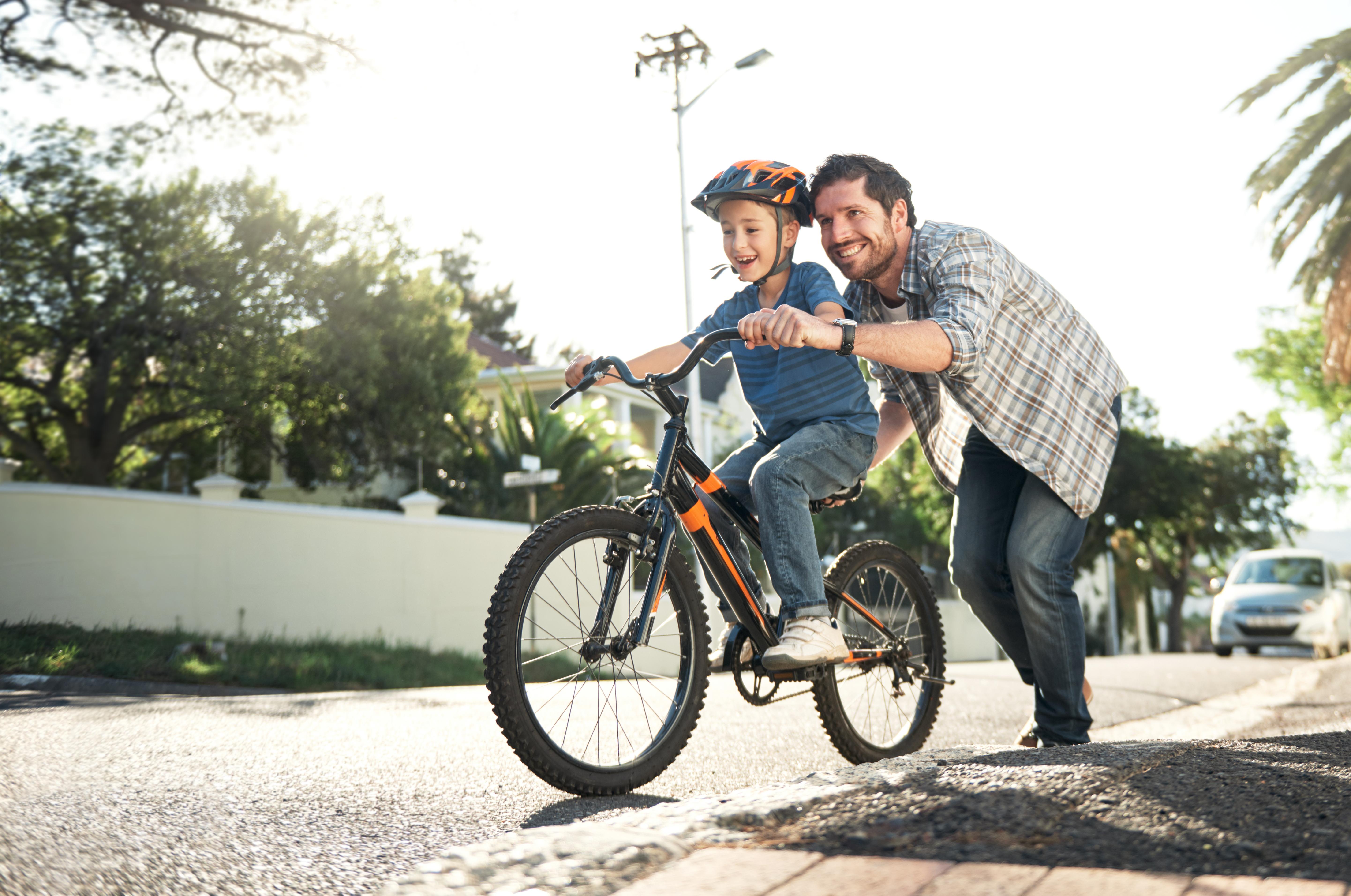 Who better to learn how to ride than with dad